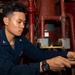 EM3 Rizaldy Gabay Conducts Preventive Maintenance in the Engine Room Aboard the USS Barry