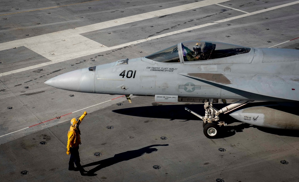 GHWB Sailor Directs Aircraft on the Flight Deck