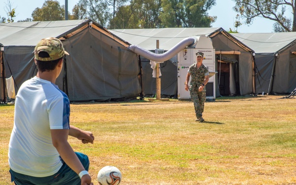 Marines interact with Afghanistan Evacuees at NAVSTA Rota