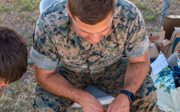 Marines interact with Afghanistan Evacuees at NAVSTA Rota