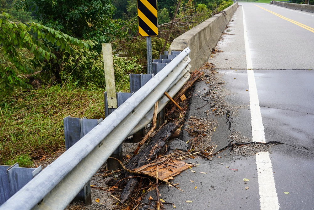 Bent Rail and Sunken Paving on Tennessee Bridge