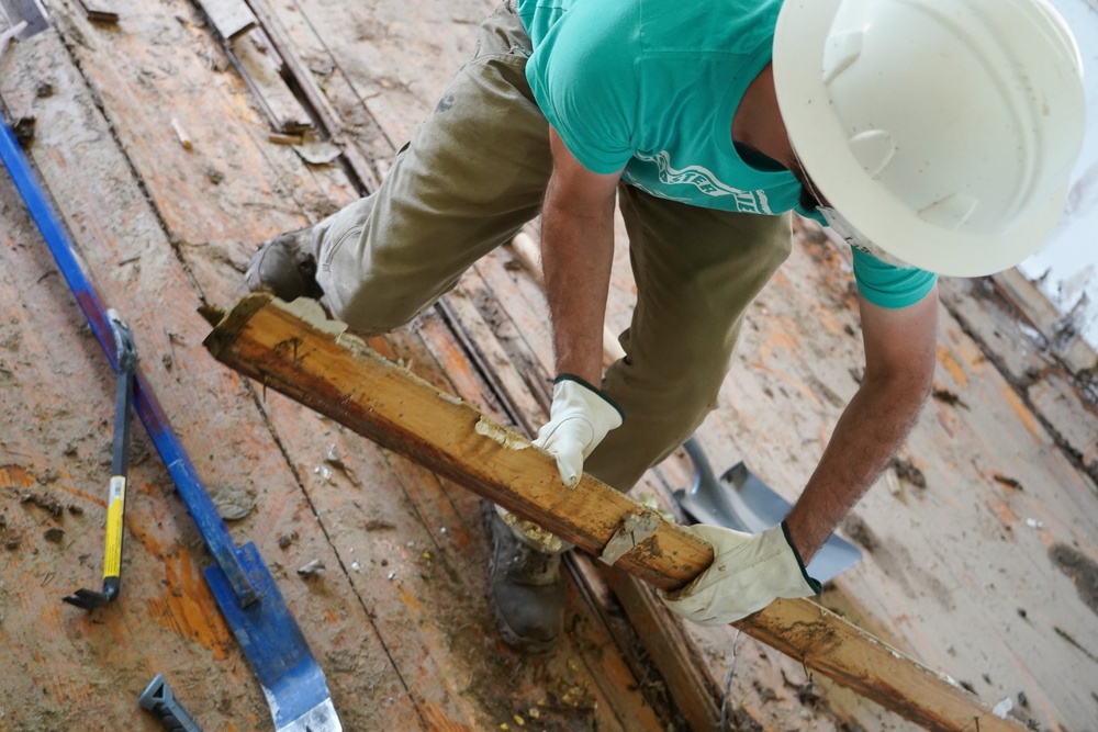 Volunteer From Tennessee First Lady's Staff Removes Debris