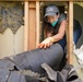 Tennessee First Lady Tosses Out Debris From Flood Damaged House