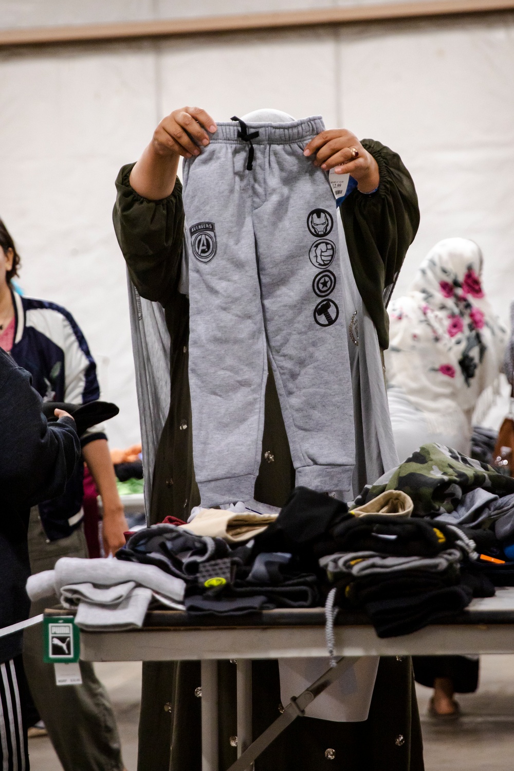 Afghan Evacuees are Given Clothing Donations with Task Force McCoy
