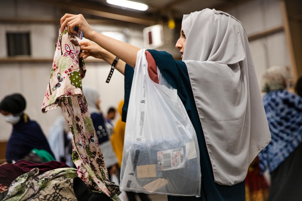 Afghan Evacuees are Given Clothing Donations with Task Force McCoy