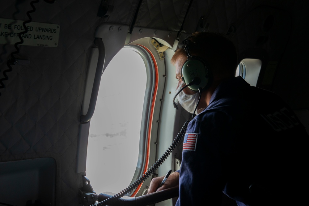 Coast Guard salvage engineering response team assesses damages during overflight
