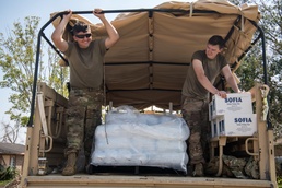 Oklahoma National Guardsmen distribute food, water to Louisiana neighborhoods after Hurricane Ida