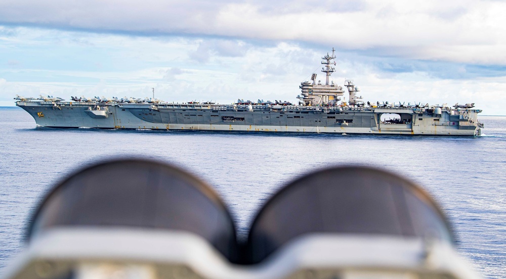 USS Carl Vinson (CVN 70) Sails With USS Tulsa (LCS 16) In The South China Sea