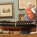 Volunteer model ship builder at Naval Museum