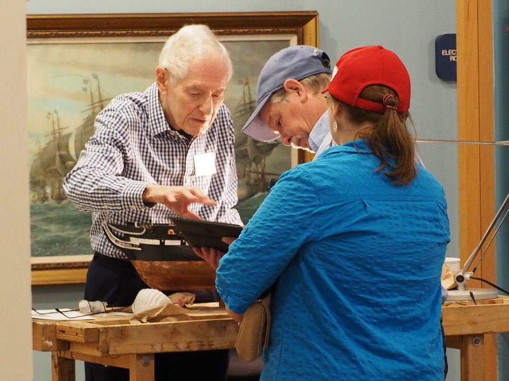 Volunteer model ship builder at Naval Museum