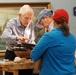 Volunteer model ship builder at Naval Museum