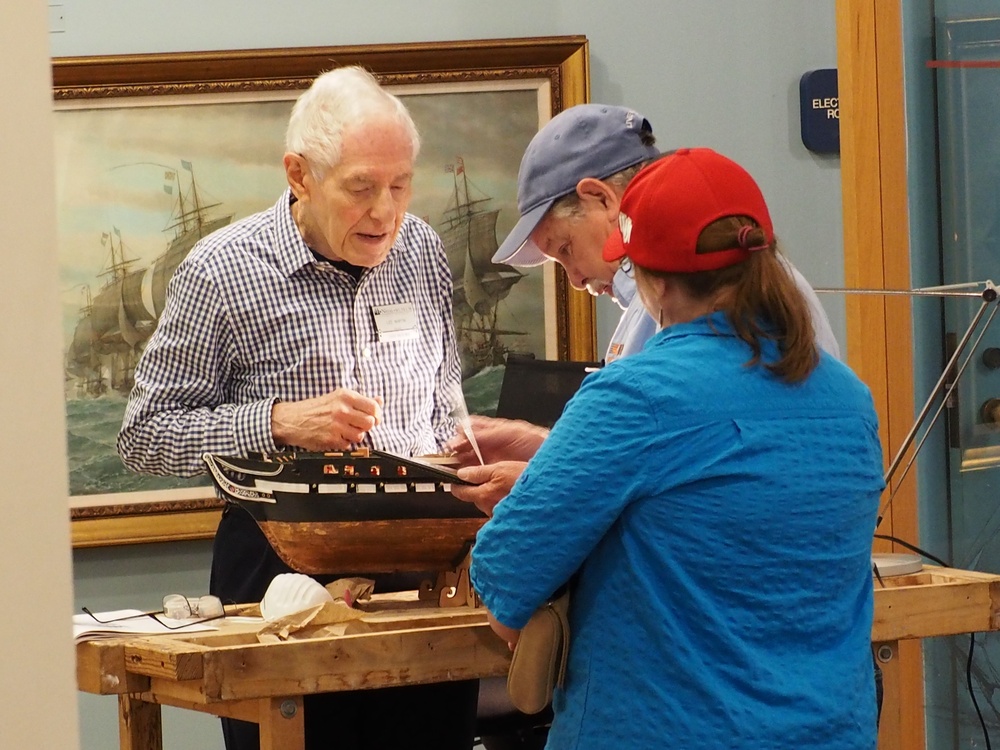 Volunteer model ship builder at Naval Museum