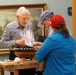 Volunteer model ship builder at Naval Museum