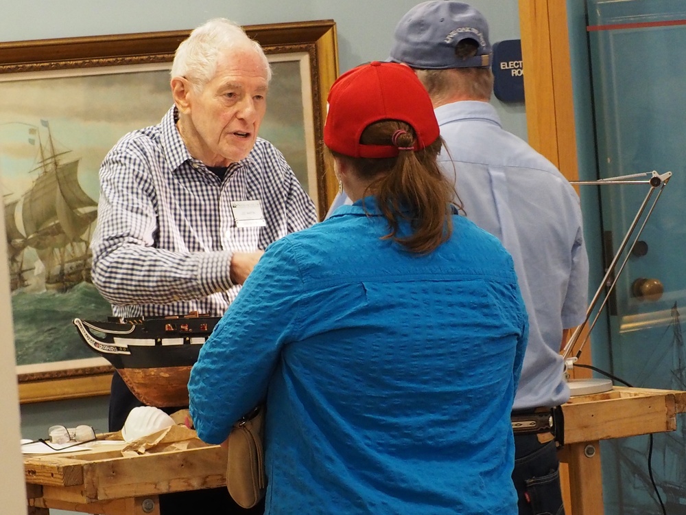 Volunteer model ship builder at Naval Museum