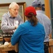 Volunteer model ship builder at Naval Museum