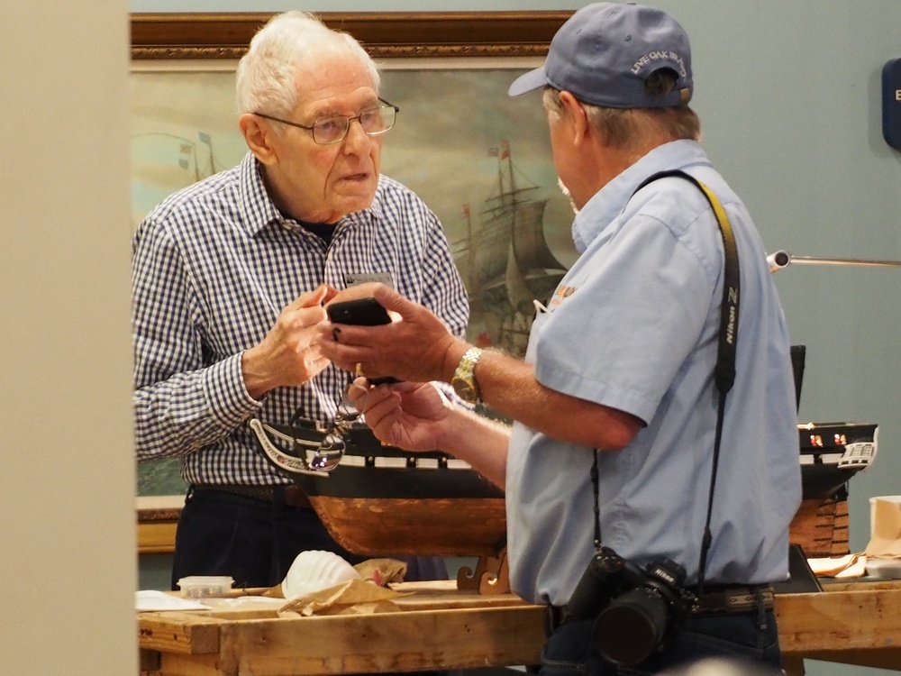 Volunteer model ship builder at Naval Museum