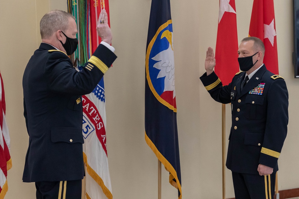 Maj. Gen. Gregory J. Mosser administers the Oath of the Commissioned Officer