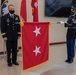 Master Sgt. Hector Galindez presents Maj. Gen. Michael D. Roache two star flag