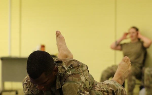 Pinning down his opponent