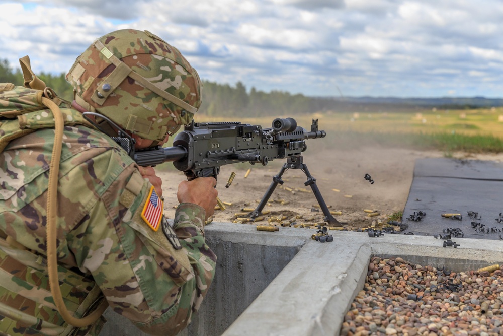 Staff Sgt. Jonathan Chacon fires an M240 machine gun