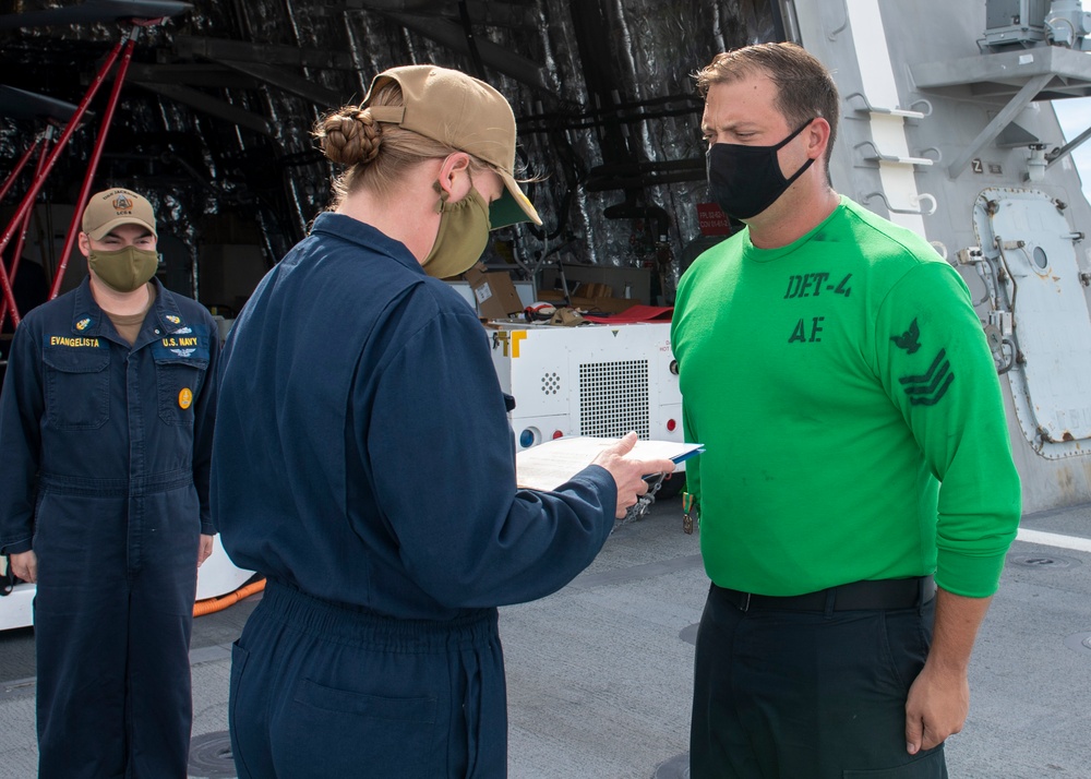 USS Jackson (LCS 6) Commanding Officer presents NAM