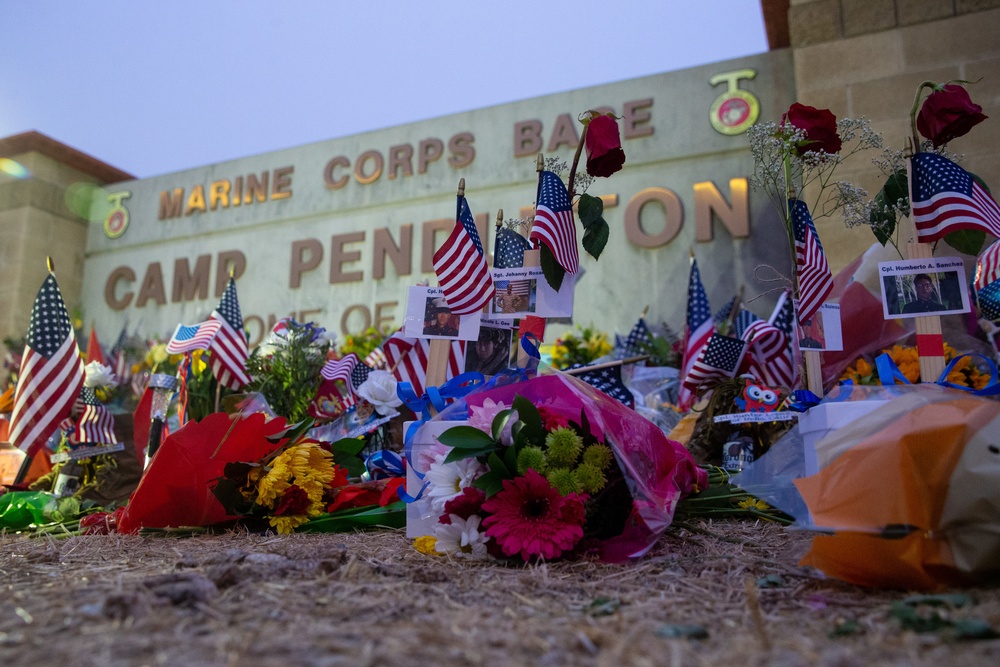 Marines, family members pay respects to fallen service members