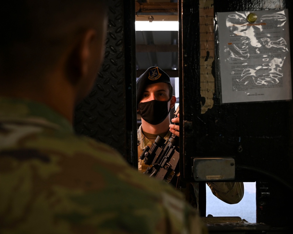 100th Security Forces Squadron Airmen perform routine weapon maintenance at RAF Mildenhall.