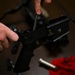 100th Security Forces Squadron Airmen perform routine weapon maintenance at RAF Mildenhall.