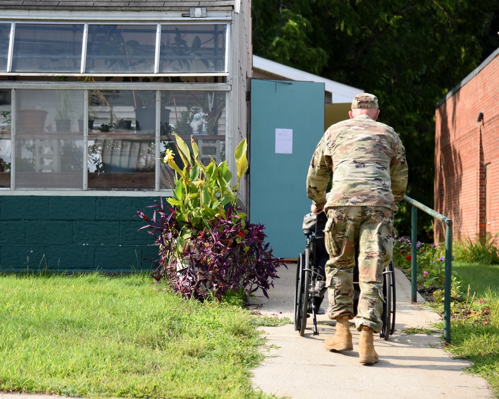 Michigan National Guard members work with veterans at the Michigan Veteran Homes at Grand Rapids