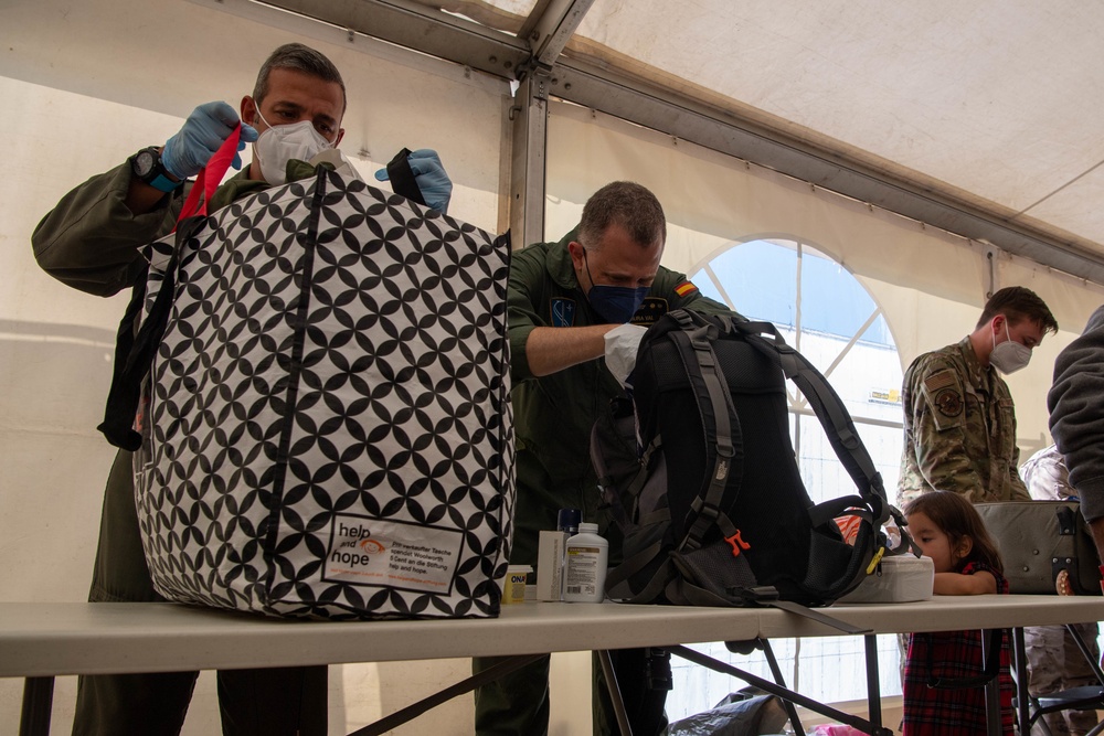 NATO Processes Outbound Afghan Evacuees