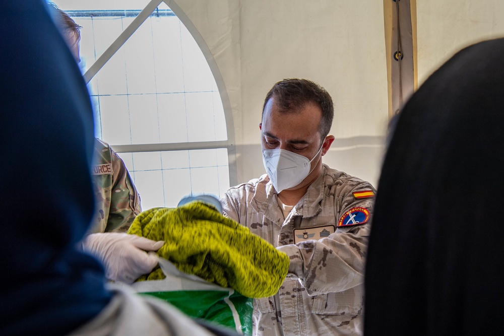 NATO Processes Outbound Afghan Evacuees