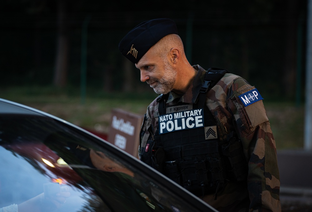 NATO Military Police Assist Security Forces