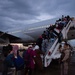 Evacuees from Afghanistan Depart NAS Sigonella for United States