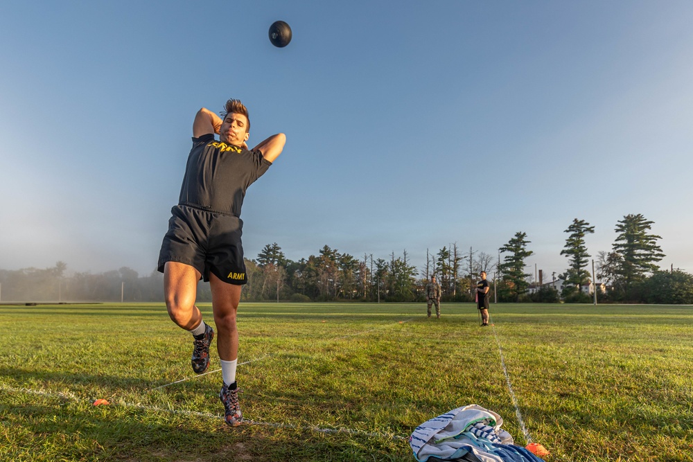 Sgt. Ryan Rudolph throws a 10 pound medicine ball