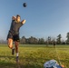 Sgt. Ryan Rudolph throws a 10 pound medicine ball