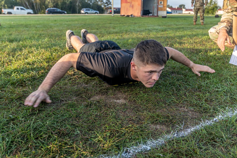 Spc. Alec Waterman performs a hand release push-up