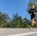 Spc. Nicholas Kyne runs