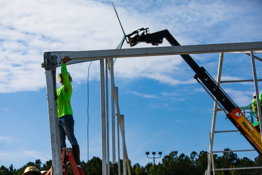 Contract Workers Set Up Support Beams for New Residential Buildings at Fort Pickett, Virginia.