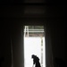 A Contract Worker Sweeps Newly Constructed Dining Facility at Fort Pickett, Virginia.