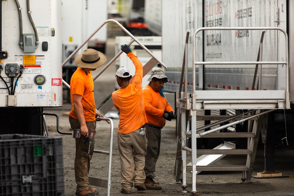 Contract Workers Assembles a Staircase for New Mobile Trailers at Fort Pickett, Virginia.