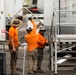 Contract Workers Assembles a Staircase for New Mobile Trailers at Fort Pickett, Virginia.