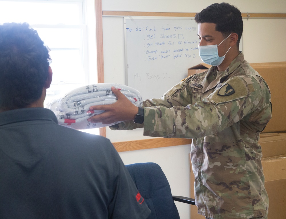 Volunteers Help Staff Comfort Care Centers at Fort McCoy