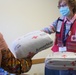 Volunteers Help Staff Comfort Care Centers at Fort McCoy