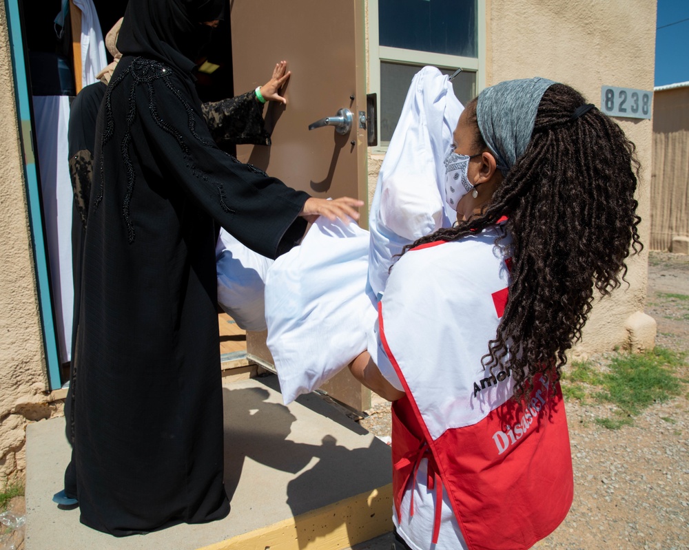 American Red Cross volunteers deliver clothes