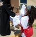 American Red Cross volunteers deliver clothes