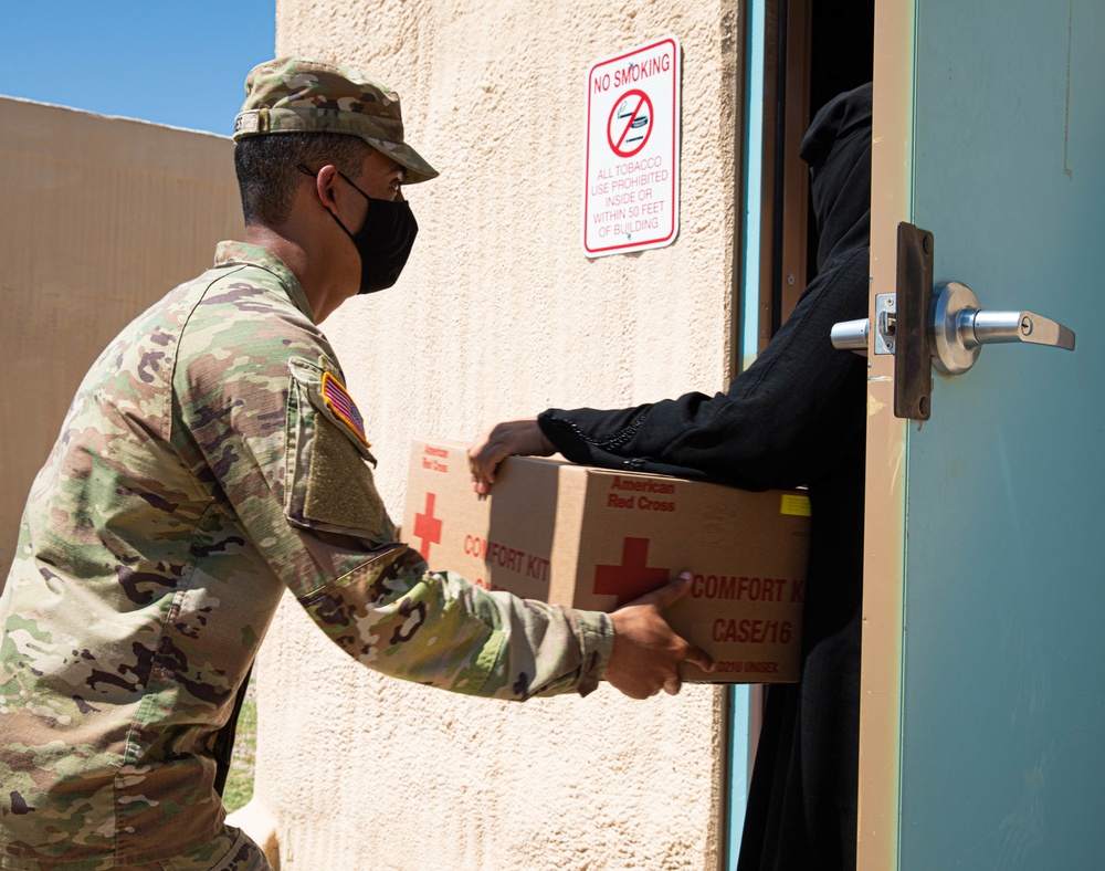 American Red Cross volunteers deliver clothes