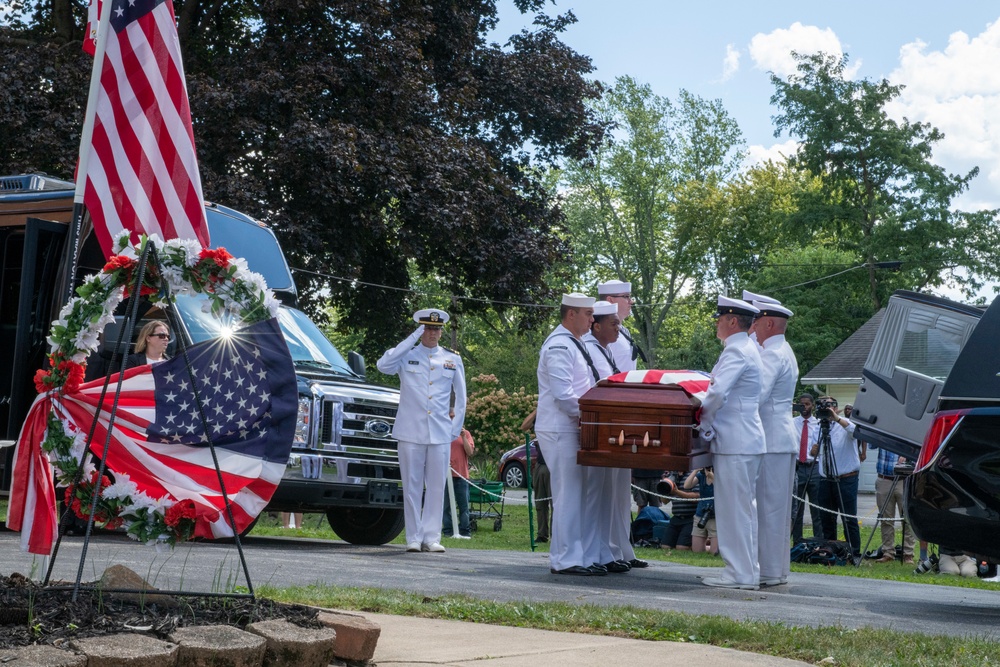 Hundreds of supporters honor HM3 Soviak with procession