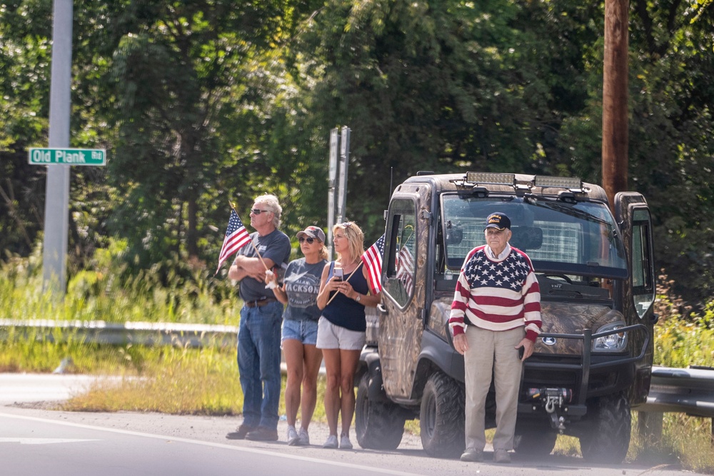Hundreds of supporters honor HM3 Soviak with procession