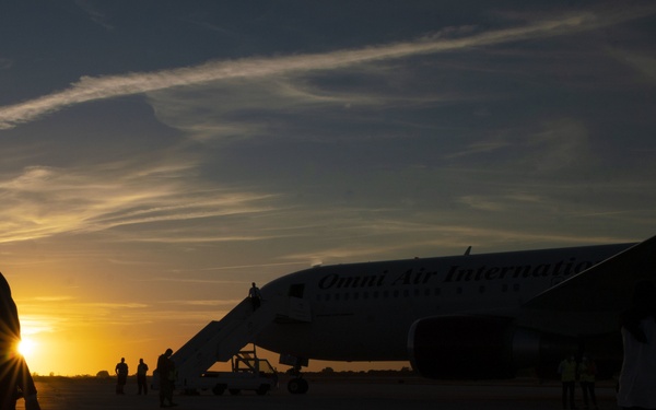 Evacuees depart NAVSTA Rota for the United States