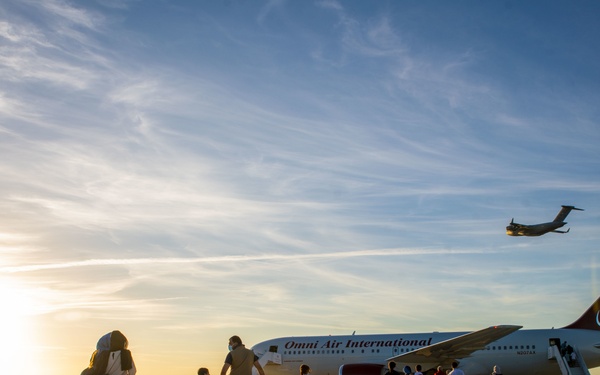 Evacuees depart NAVSTA Rota for the United States